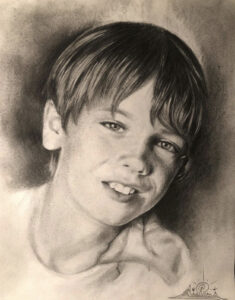 Retrato realista a lápiz de un niño