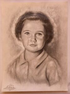 Retrato realista a lápiz de niña pequeña