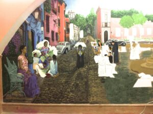 Fragmento de un mural de gran formato que representa una plaza imaginaria de la colonia San Ángel en Ciudad de México, ambientado en unos 1930 alternativos, con escenas cotidianas y figuras en proceso de creación. Obra que fusiona arte urbano, narrativa visual y cultura local en un entorno arquitectónico